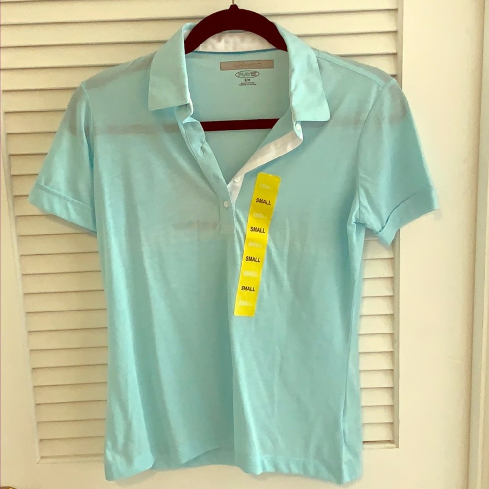 Blue polo shirt by Greg Norman
